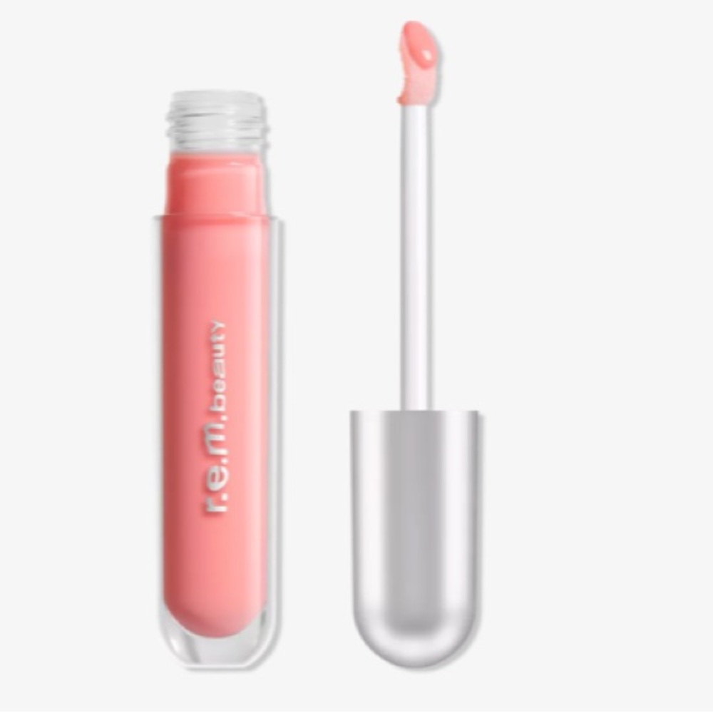 NIB r.e.m. beauty essential drip glossy balm in the color cosmo PETA APPROVED Ve